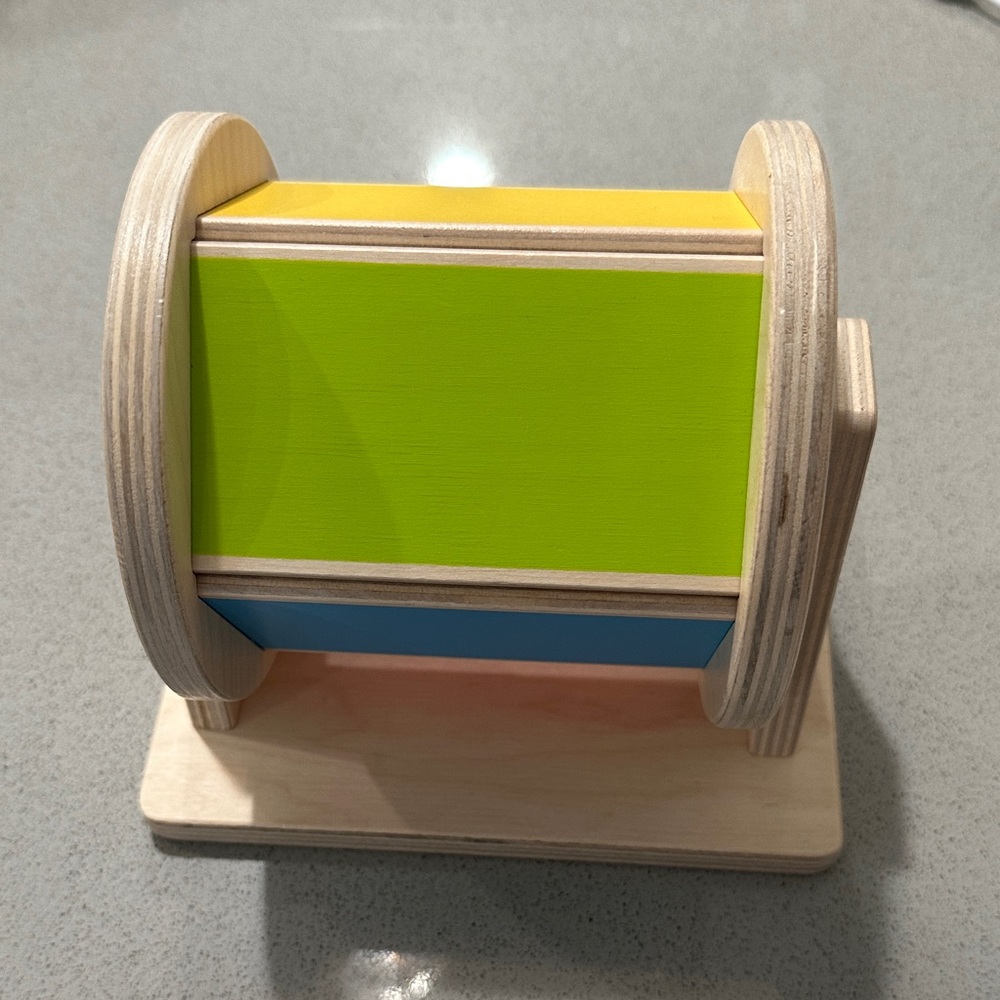 Vibrant Wooden Rotating Drum Toy
